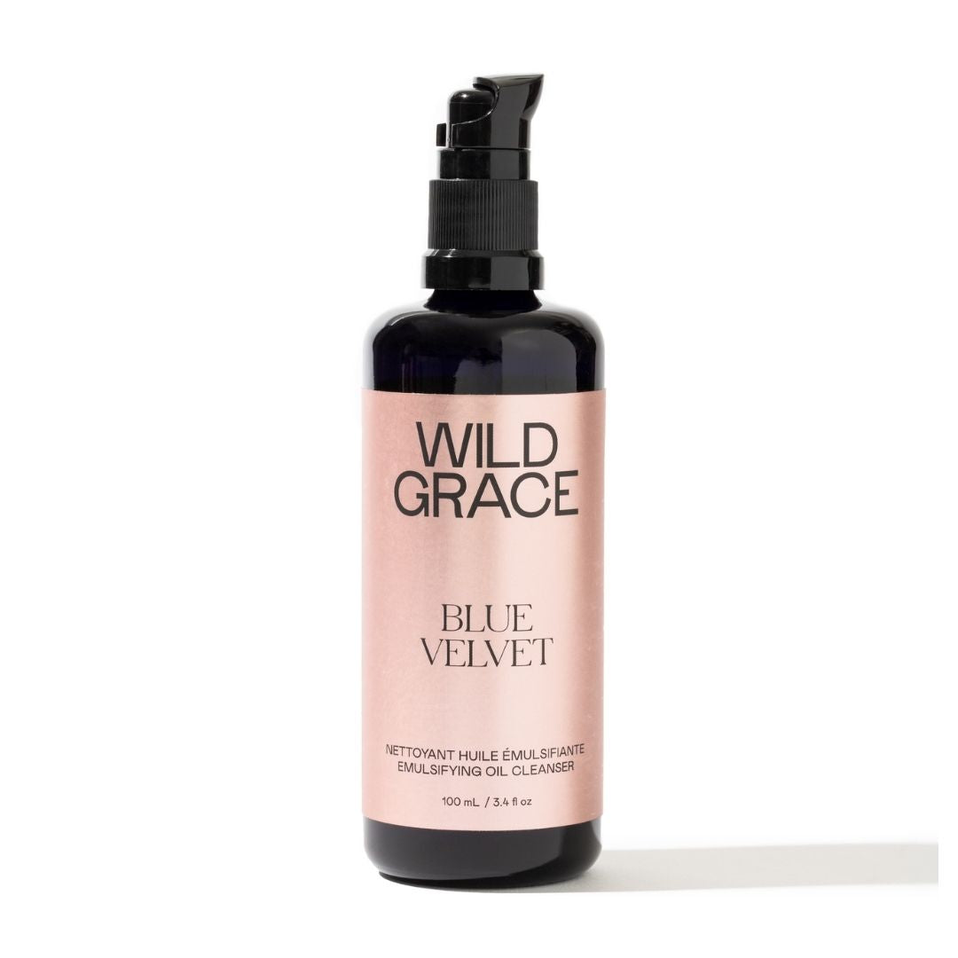 Bottle of Wild Grace Blue Velvet emulsifying oil cleanser on a white background