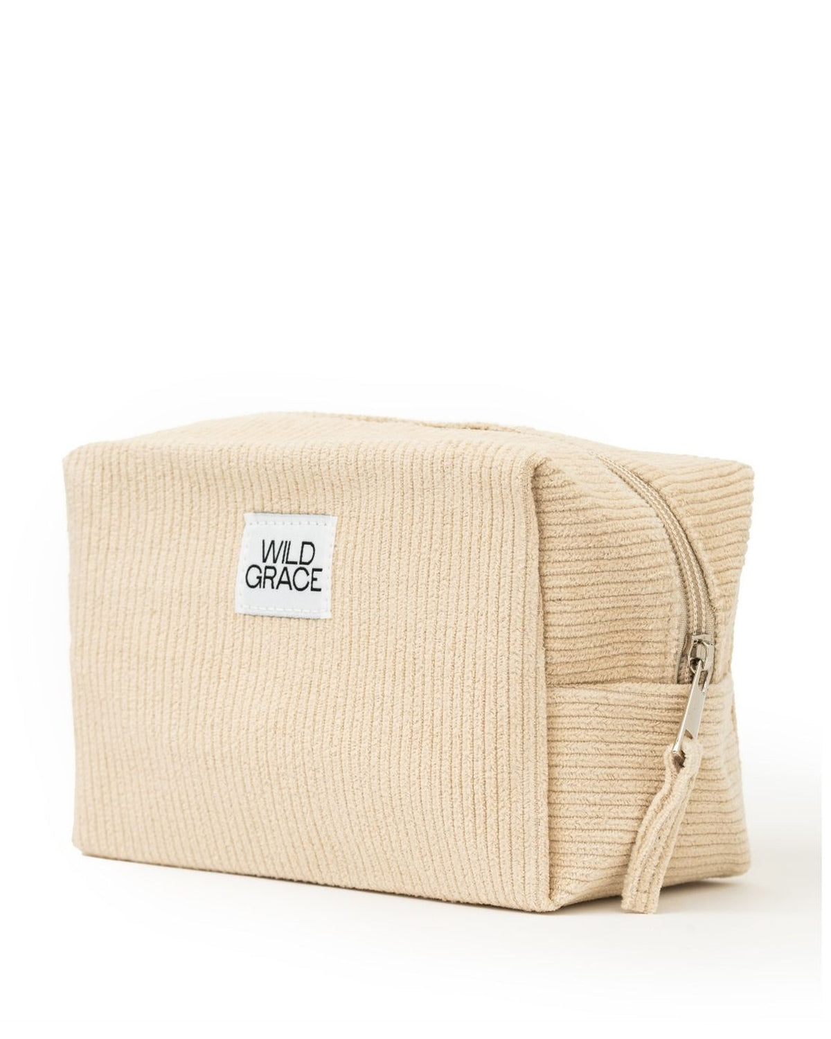 Beige textured pouch with 'Wild Grace' label on a white background
