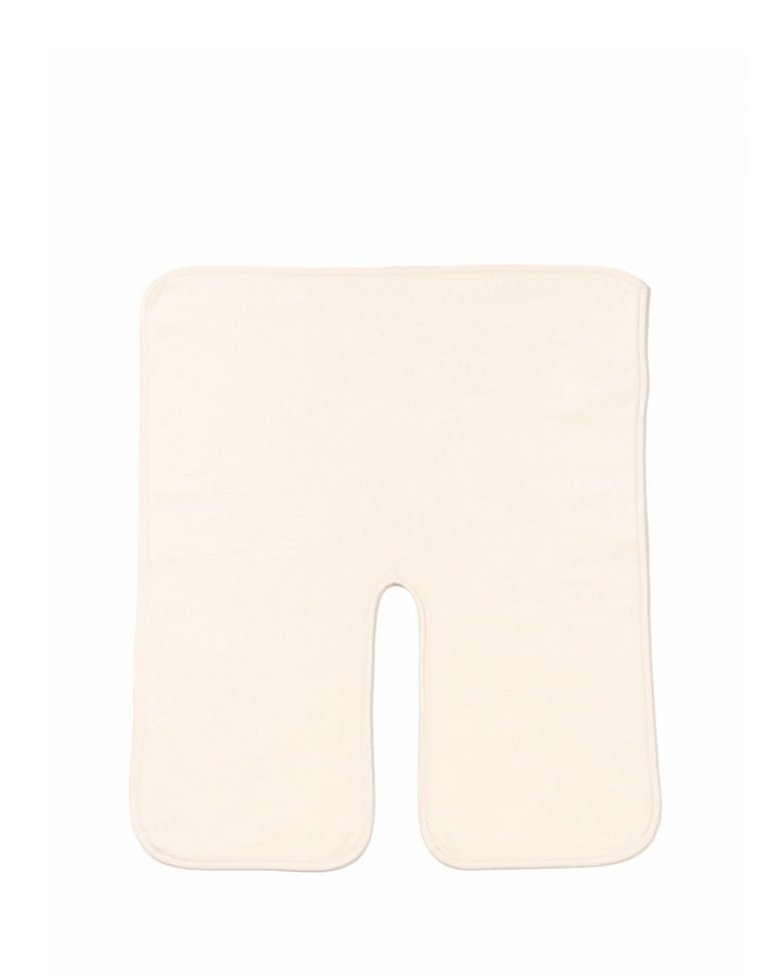An off-white U-shaped contoured massage pillow on a solid white background.