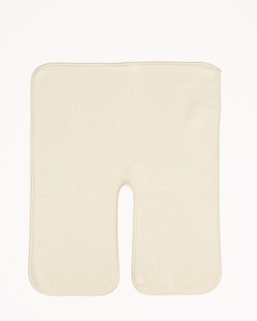 An off-white U-shaped contoured massage pillow on a solid white background.