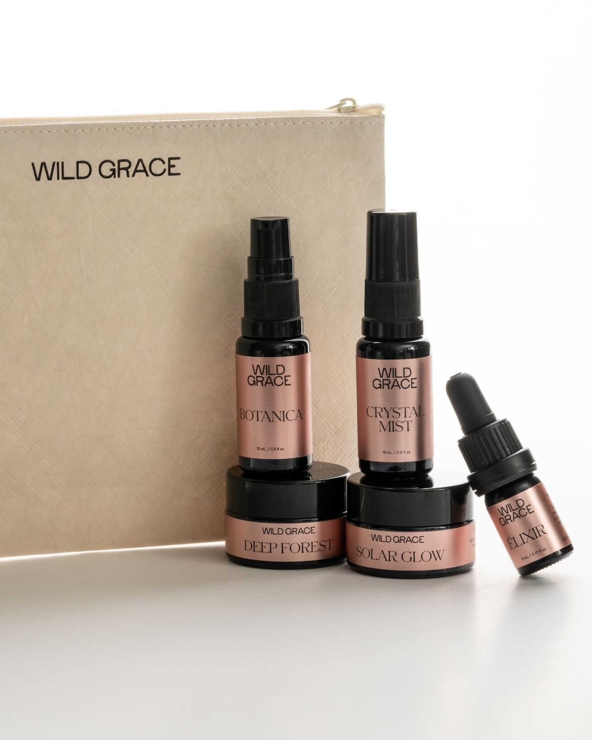 Wild Grace skincare products including bottles and jars on a white background