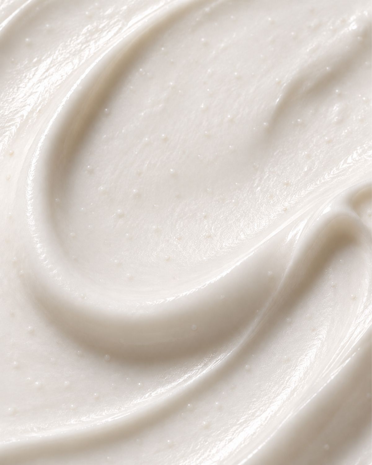 A textured swipe of white cream 
