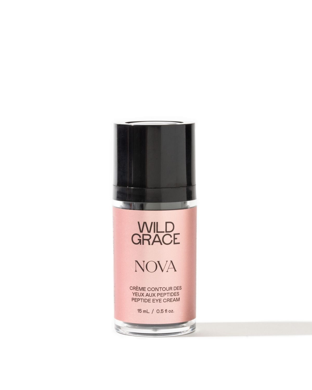 Wild Grace Nova Peptide Eye Cream in a clear glass bottle with a black cap and a light pink label, set against a plain white background.
