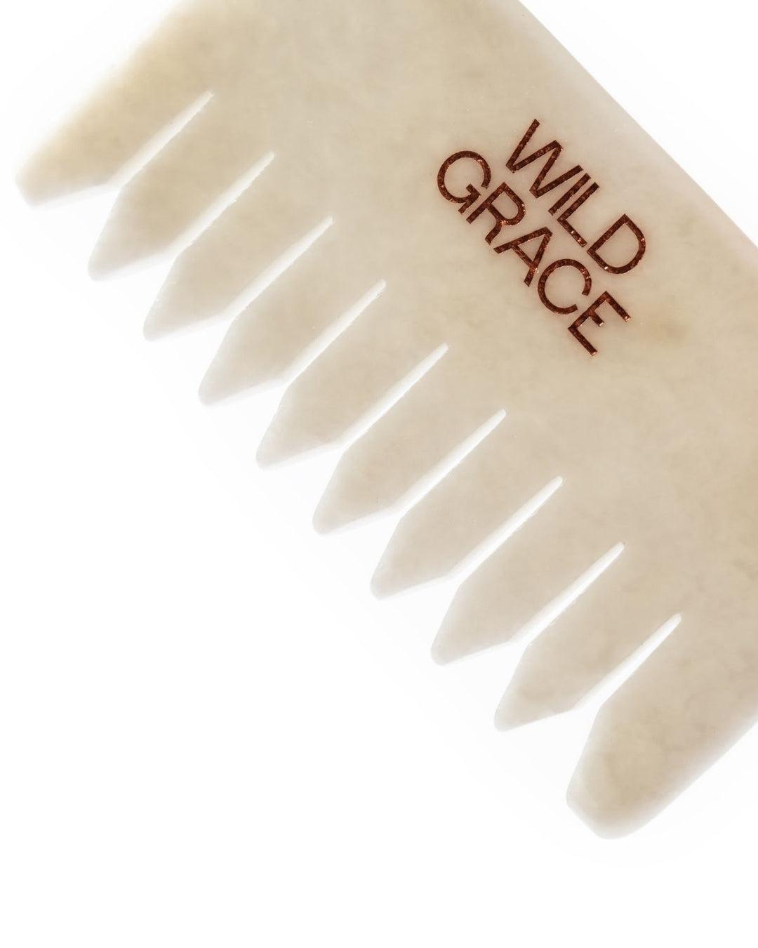 White jade scalp comb with &