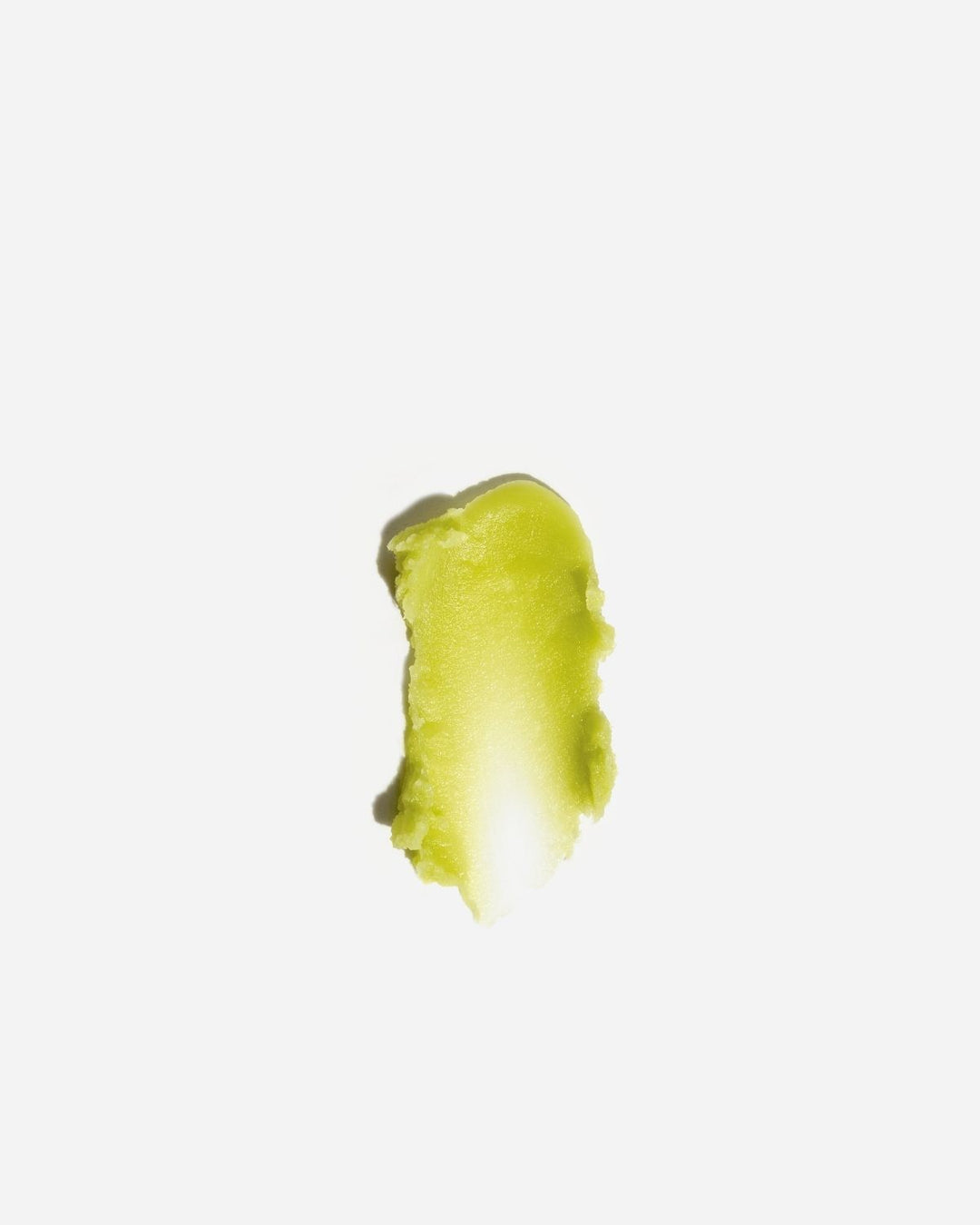 Green texture of deep forest cleansing balm on a white background