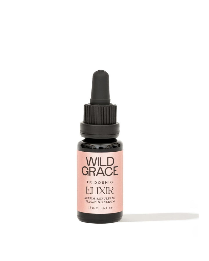 Bottle of Wild Grace elixir plumping serum on a white background