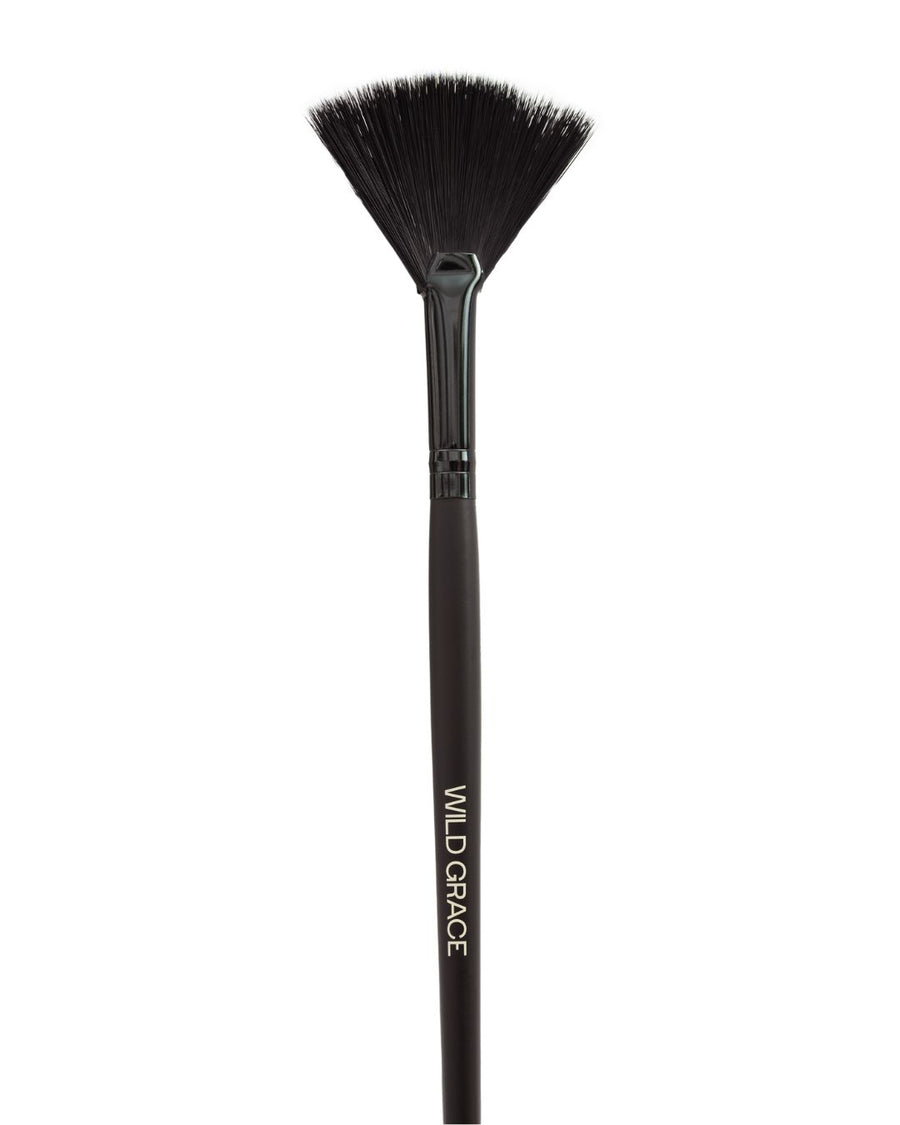 Black fan brush with 'Wild Grace' branding on a white background