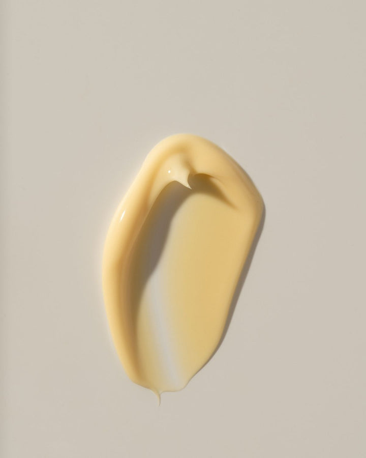 pale-yellow colored wild garce solar glow clream on a light gray background